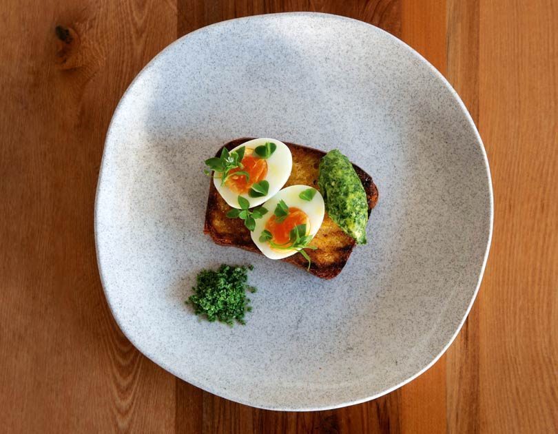 BOILED DUCK EGG ON BRIOCHE WITH HERB BUTTER & HERB SALT BOILED DUCK EGG ON BRIOCHE WITH HERB BUTTER & HERB SALT