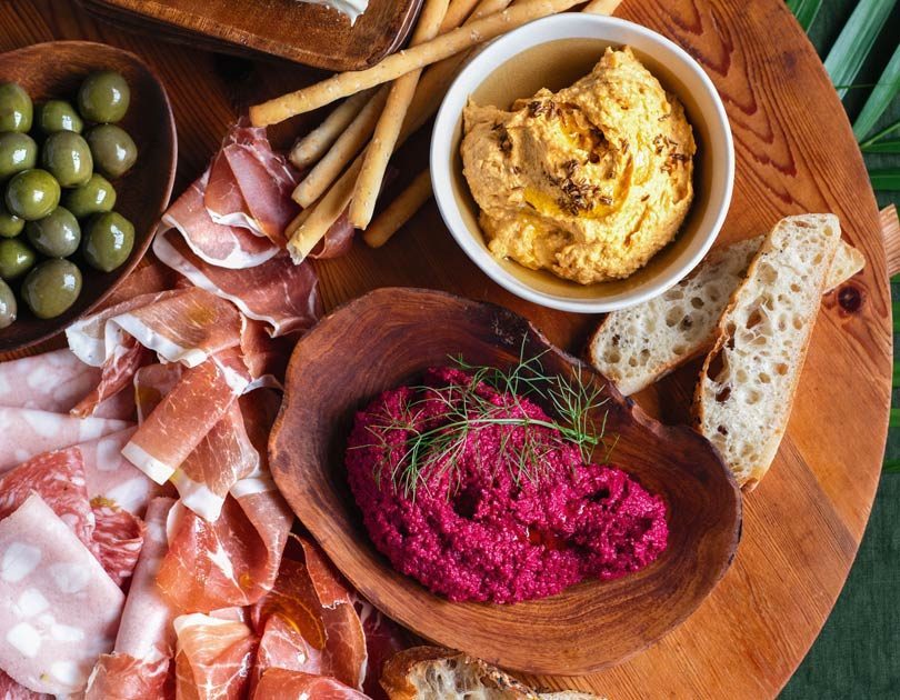 Antipasto Platter with Roast-Cumin Kumara Hummus & Baby Beetroot Hummus