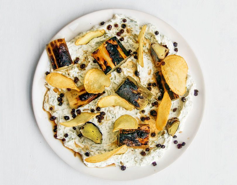 Braised, Charred Leeks, Dill Labneh, Potato Crisps & Pickled Currants