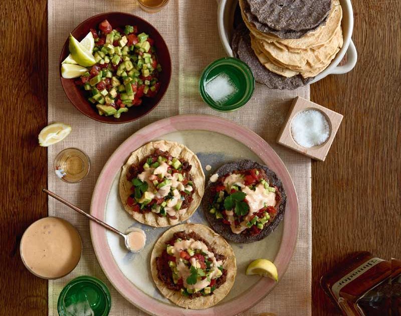 TOSTADA WITH CASHETA CHIPOTLE SAUCE, REFRIED BEANS & SALSA