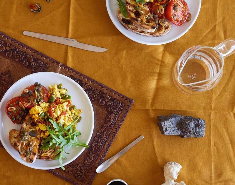OLIVE & TOFU SCRAMBLE WITH STEWED TOMATO & CAPER TOASTS