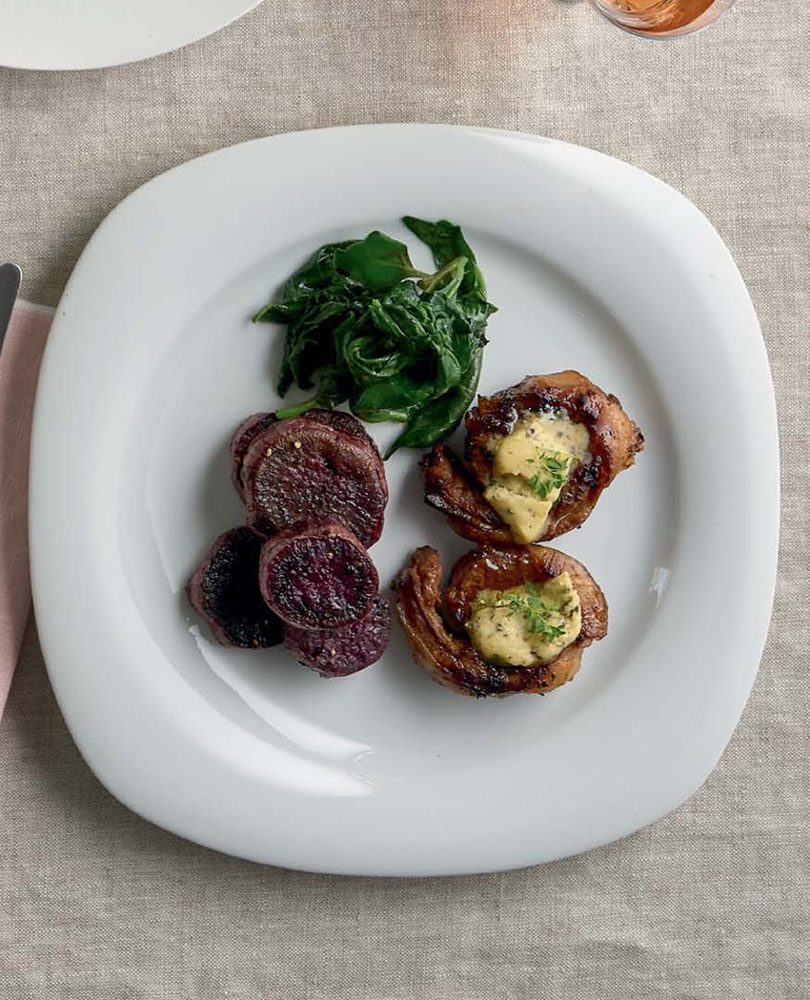 NOISETTES OF LAMB WITH HONEY & HERB BUTTER, KŪMARA DISCS & WILTED GREENS NOISETTES OF LAMB WITH HONEY & HERB BUTTER, KŪMARA DISCS & WILTED GREENS